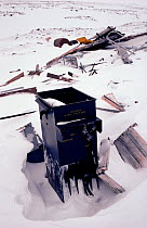 Electrical transformer, a source of PCBs, discarded by the US military at old DEW Line site on the Melville Peninsula. Nunavut, Canada, 1992.