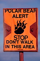 Polar bear (Ursus maritimus) alert warning sign - Dont' walk in this area -  Churchill, Manitoba, Canada, 1981.