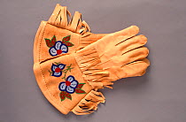 Pair of embroidered Cree moosehide gauntlets. Northern Quebec, Canada, 1987.