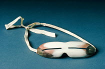 Thule Culture / Inuit snow goggles made from Caribou / Reindeer (Rangifer tarandus) antler, with slits to prevent snow blindness, Canada.