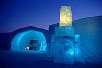 Ice sculpture by entrance to Ice Hotel at dusk. Jukkasjarvi, Sweden, 2003.