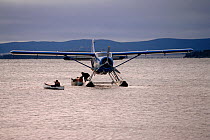 'Otter' float plane bringing supplies to Innu Autumn hunting camp in Southern Labrador, Canada, 1997.