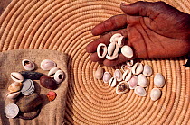 Dogon elder telling the future with Cowrie shells. Mali, West Africa, 1981.