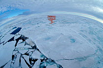 North Pole sign at the top of the World. The North Pole, Arctic Ocean, 1998. Digitally composed.