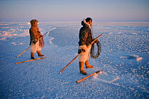Inuit hunters waiting on thin sea ice for Walrus. Siorapaluk, Northwest Greenland, 1977