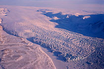 Fast moving Politiken Glacier flowing from Greenland Icecap into the frozen sea. Northwest Greenland, 1998.