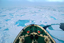 Bow of Russian icebreaker "Kapitan Dranitsyn" cutting through sea ice. Franz Josef Land, Russia, 2004.