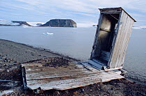 Remains of outside toilet at old polar station at Tichaya Bay. Hooker Island, Franz Josef Land, Russia, 2004.