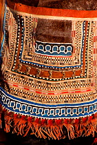 Detail showing front of Even woman's traditional apron. Koryakia, Kamchatka, Siberia, Russia, 1999.