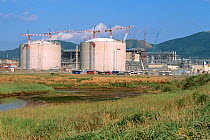 Gas storage tanks at Pregorodnaye where Sakhalin Energy's Liquid Natural Gas processing facility is under construction. Aniva Bay, Sakhalin Island, Russian Far East, 2006.