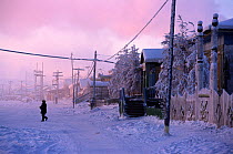 Winter street scene in Verkhoyansk, the coldest town in the Northern Hemisphere. Yakutia, Siberia, Russia, 1999.