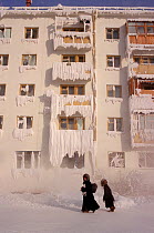 Appartment block coated in ice and frost during winter in Yakutsk. Yakutia, Siberia, Russia, 2001.