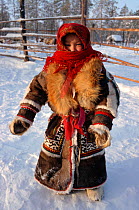 Forest Nenets girl in traditional dress. Numto, Khanty Mansiysk, Western Siberia, Russia, 2000.