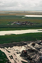 Damaged tundra and debris in Gazprom's Bovanenkovo gas field. Yamal, Western Siberia, Russia, 1993.