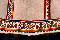 Detail of elaborate sewing on hem of Nenets woman's Reindeer skin Yagushka (coat). Yamal, Siberia, Russia, 1996.