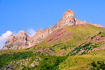 Chipeta Alta peak and karst limestone escarpment leading to Sayestico peak, Spanish Pyrenees, above Hecho valley, Huesca, Aragon, Spain. July 2009