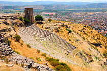 Hellenistic / ancient Greek amphitheatre at the Acropolis of Pergamon with the modern city of Bergama in the background, Turkey. August 2009