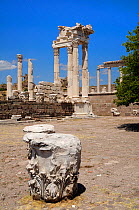 Roman Temple of Trajan at the Acropolis of Pergamon (Bergama), with fallen column capitals in the foreground, Turkey. August 2009