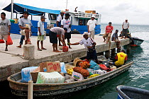 Boat bringing supplies to the island of Wichub-Wala, San Blas islands, Panama, November 2008