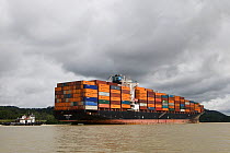 Container freighter travelling through the Panama canal, Panama, November 2008