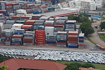 Cargo containers and cars waiting for transport at the port, Panama canal, Panama, November 2008