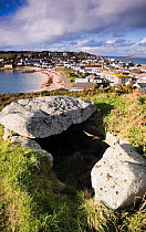 Buzza Hill Burial Chamber (later Neolithic  early Bronze Age) and view over Hugh Town. St Mary's, Isles of Scilly, December 2009.