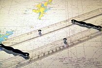 Parallel rules on navigation chart aboard trawler on the North Sea, 2010.