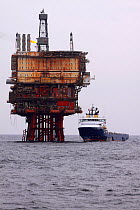 Oil rig supply vessel "Strilmoy" offloading at the "Beryl bravo" platform, North Sea, March 2010.