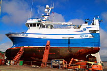 Fishing vessel "Harvester" on Skagen slipway, Denmark. March 2010, Property released.