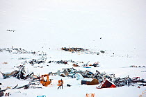 City dump near Village of Ittoqqortoormiit, Scoresbysund, North East Greenland, February 2009.