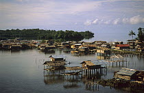 Sowek village on pile foundations, showing houses on stilts over water, Biak island, Western Papua, Indonesia, August 2002 (West Papua).