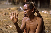 Portrait of Dani woman holding up her hand to show cut fingers, which signify mourning. Baliem valley, West Papua, former Irian-Jaya, Indonesia, August 2002 (West Papua).