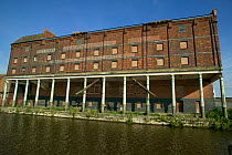 Gloucester docks - modern regeneration - re-use of ancient warehouses from Industrial Revolution. Severn Estuary. Gloucestershire, England, UK. September 2009