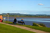 Tourists / local residents enjoying views of the Severn Estuary. England, August 2009