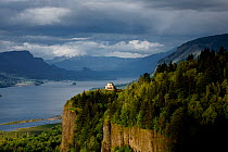 View of Vista House on Crown Point from Portland Women's Forum State Park along the Columbia River Scenic Highway part of the Columbia River George National Scenic Area. Oregon, USA, May 2009