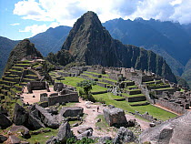 The ruins of Macchu Pichu, World Heritage Site of Humanity and one of the Seven Wonders of the World, in Cusco Department, Andes mountains, Peru.