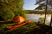 Kayak and tent set up by the Androscoggin River, Mollidgewock State Park in Errol, New Hampshire, USA, August 2008.