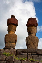 Stone figurative sculptures / Moai of Ahu Nau Nau sacred site at Anankena beach, Easter Island, South Pacific. October 2009
