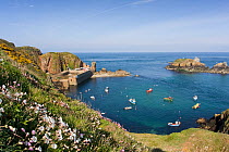Boats moored in the natural harbour of Les Laches,  Sark, Channel Isles, UK, Summer 2009