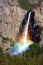 Sunlight creating a rainbow in the spray of the Bridalveil Falls, Yosemite National Park, California, USA, June 2008