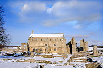 Winter landscape showing Binham priory, in snow, North Norfolk UK, December 2009