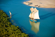 Aerial view of Cargo boat on the river, Morondava, West Madagascar. November 2008