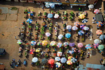 Aerial view of street market stalls in a town near Tana, Madagascar. November 2008