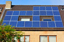 Solar panels on roof of house, Belgium October 2009
