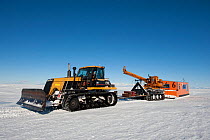 Bulldozer and heavy machinery for drilling through the ice for BBC filming crew, McMurdo Sound, Ross Sea, Antarctica, November 2008