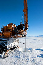 Heavy machinery for drilling through the ice to create an ice-hole for BBC filming crew, McMurdo Sound, Ross Sea, Antarctica, November 2008