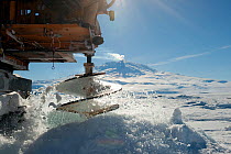 Heavy machinery for drilling through the ice to create an ice-hole for BBC filming crew, McMurdo Sound, Ross Sea, Antarctica, November 2008