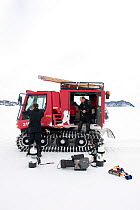 Tracked vehicle with BBC film crew and equipment, McMurdo Sound, Ross Sea, Antarctica, November 2008