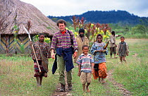 Producer Huw Cordey with Huli people in Papua New Guinea during the filming of 'Jungles' for the BBC NHU Planet Earth series, August 2004.