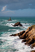 Heavy seas at La Vieille lighthouse, Pointe du Raz, Brittany, France. November 2006.